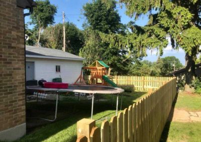 wood fence trampoline