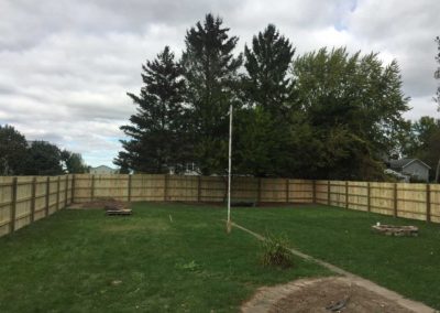 wood fence flag pole